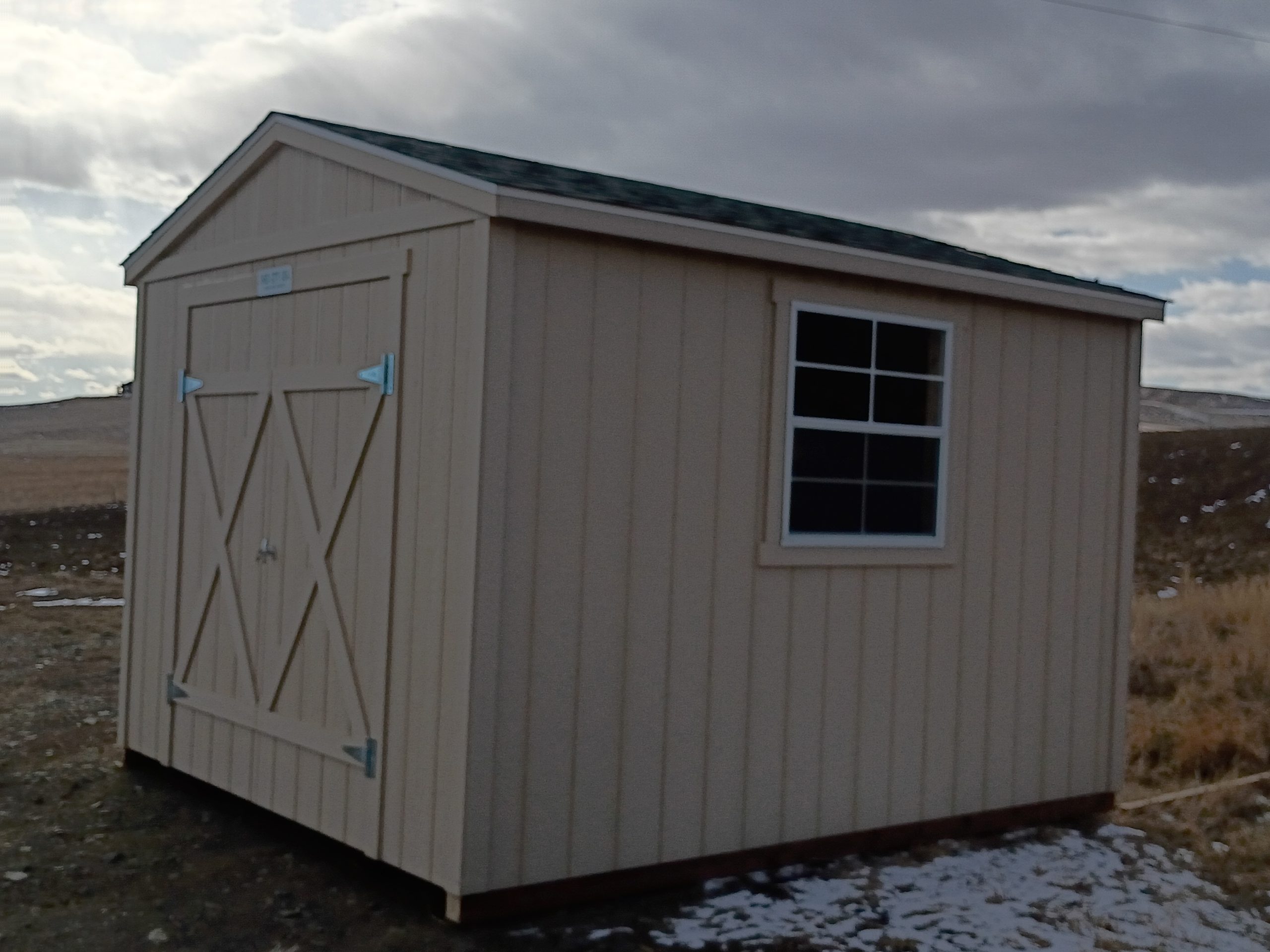 10 x 12 Ranch with double doors and a window and shelf